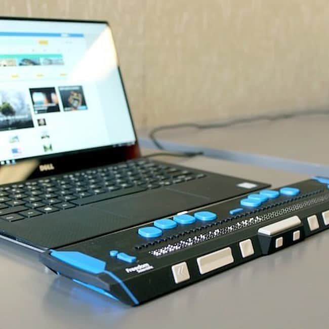 Laptop with braille reader 230321 105344