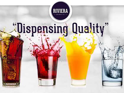 a graphic with a silvery background and four drinks lined up next to each other. One is a brown read colour, one red, one orange and one clear water. All the drinks are splashing up into the air