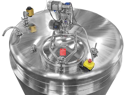 a cropped image of the top of a large silver metal mixing vessel