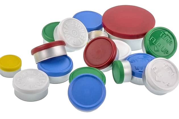 A selection of coloured crimp seals with plastic disks.