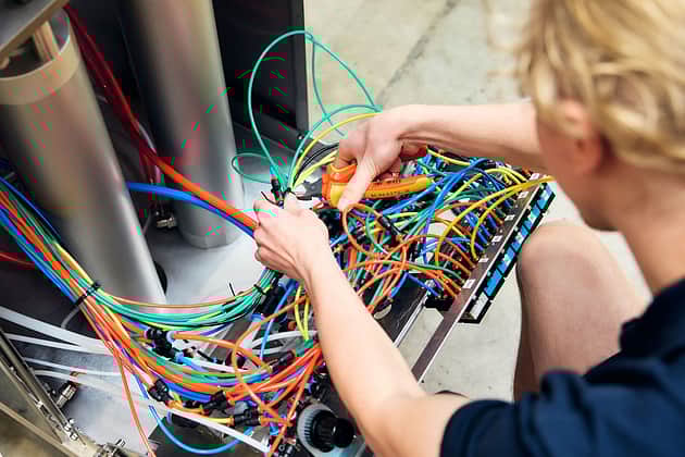 Adelphi 0515 P Erson sorting and fitting electirc cables