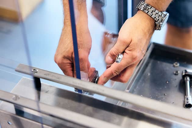 Adelphi 0856 Close UP of Hands fitting parts together