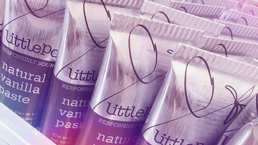 a close up of a group of silver and purple crimped tubes with the LittlePod printed near the top
