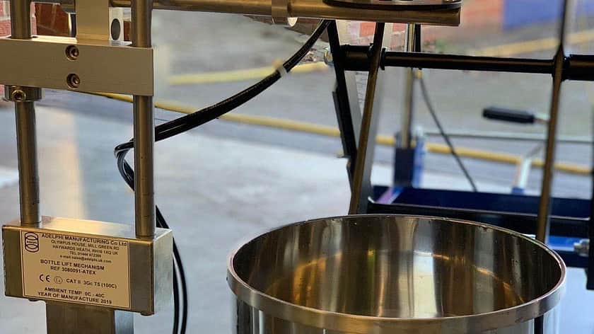 a close up of a metal mixing vessel