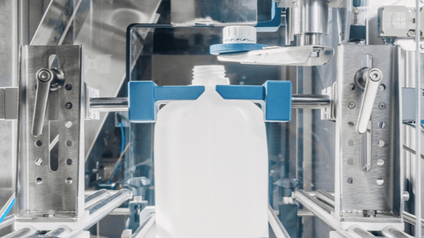 Powercap Bottle In Conveyor Front On 600 x 600