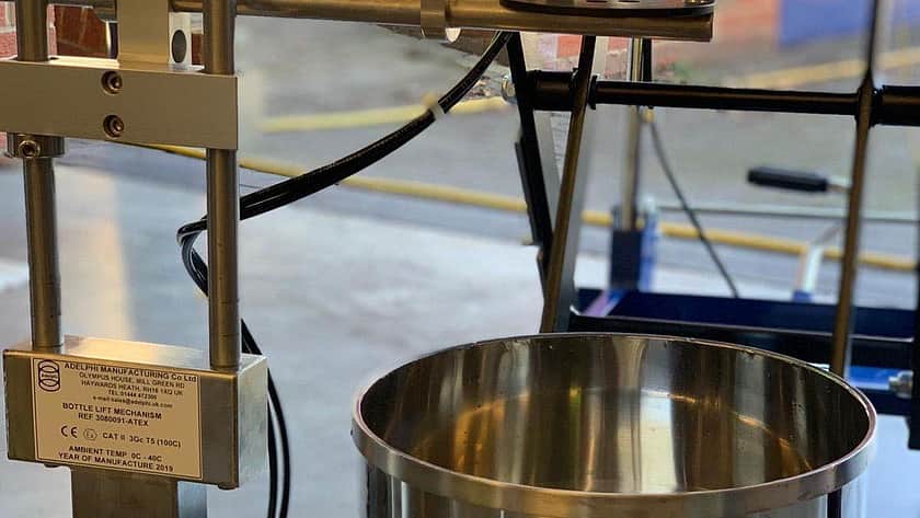 a close up of a metal mixing vessel