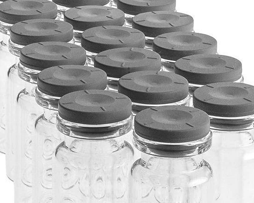 A selection of glass jars with black tops