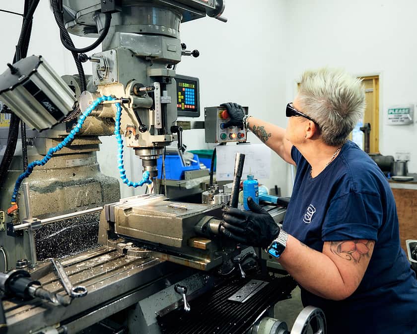 Adelphi 1250 person setting up drilling machine