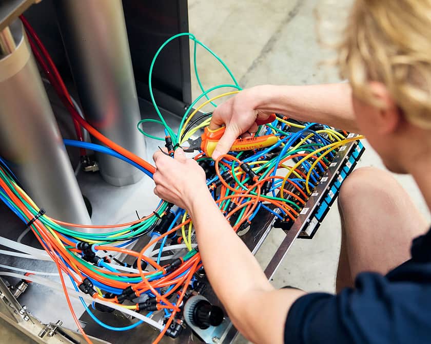 Adelphi 0515 P Erson sorting and fitting electirc cables