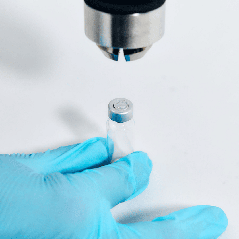 Adelphi Products 0157 Vial Crimping Tongs In Use Hovering Over Cap 600 x 600