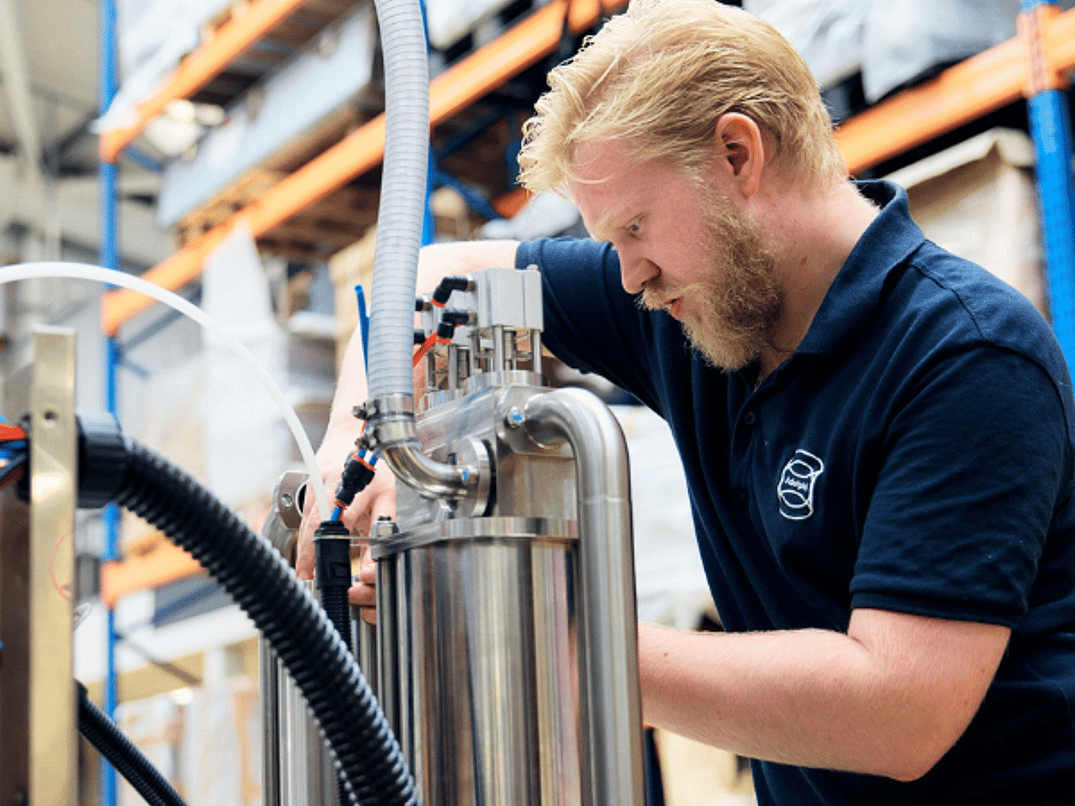 Someone Working On Semi Automatic Volumetric Filling Machine 600 x 600