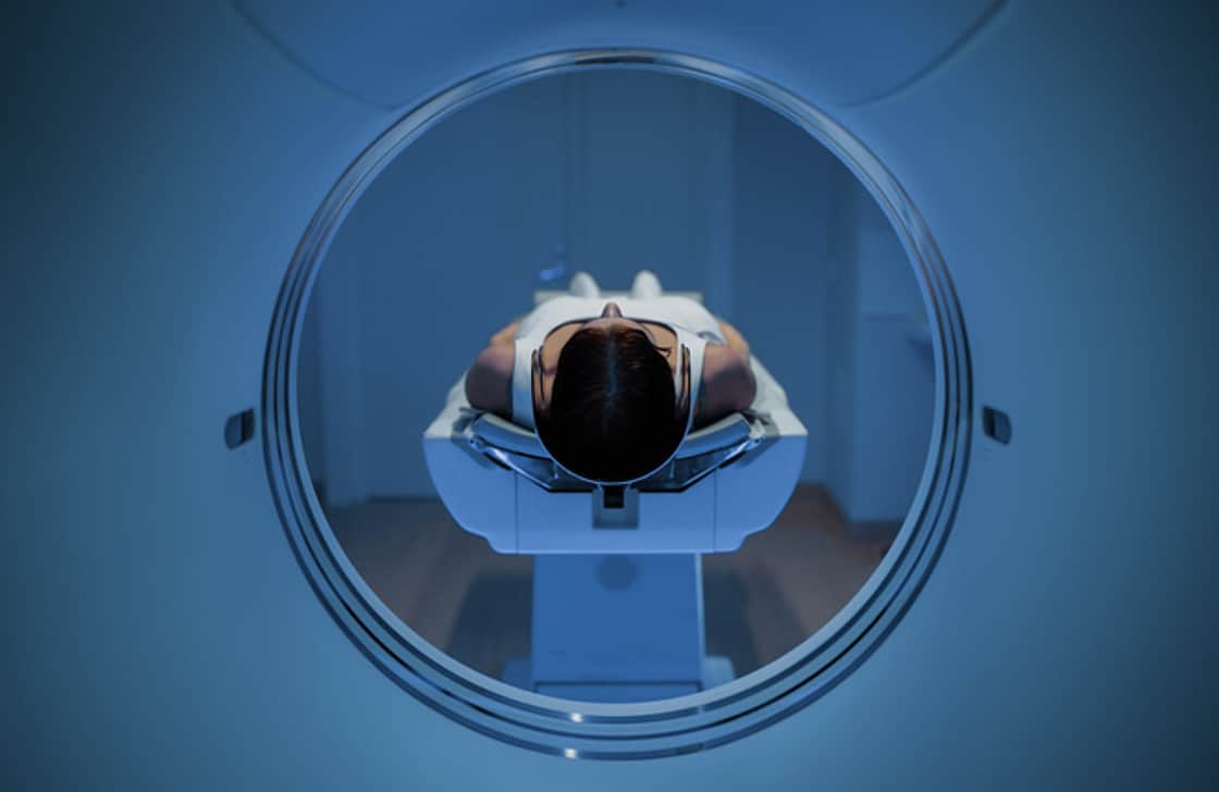 A woman in a PET scanner.