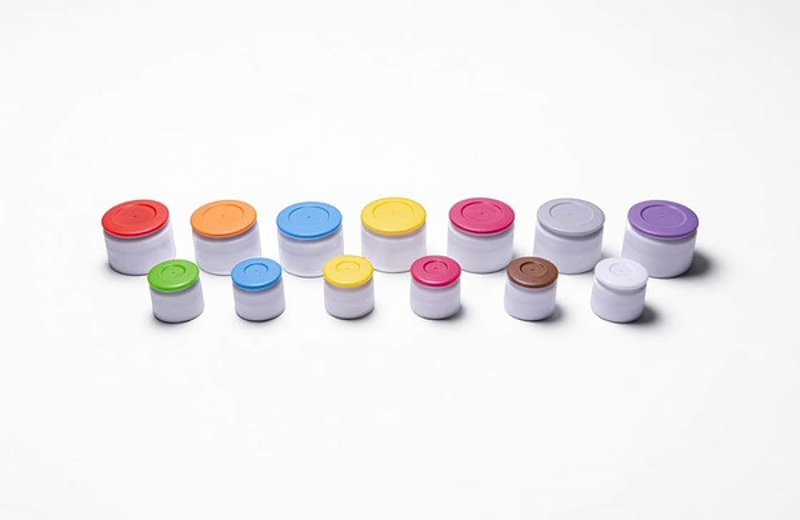 A selection of 20mm and 13mm RayDyLyo caps with colourful tops.