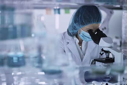 Microscope with full lab suit right