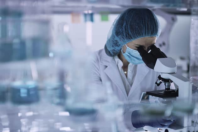 Microscope with full lab suit right