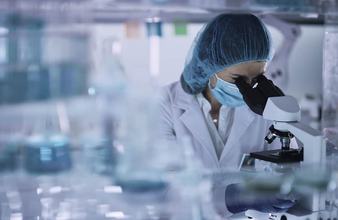 Microscope with full lab suit right